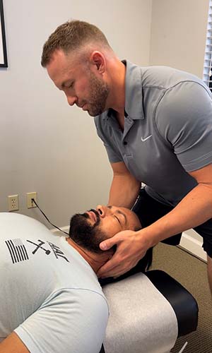 Chiropractor Sunrise FL Jonathan Ozner Adjusting Client
